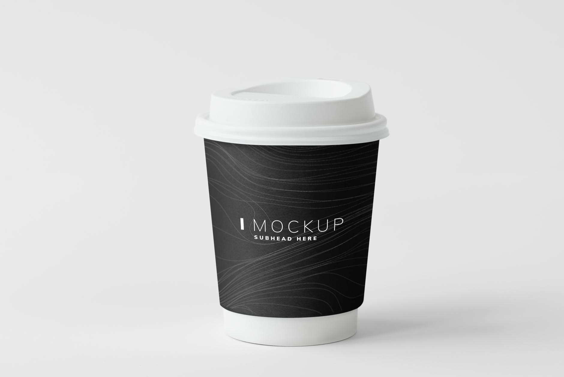 white and black plastic cup
